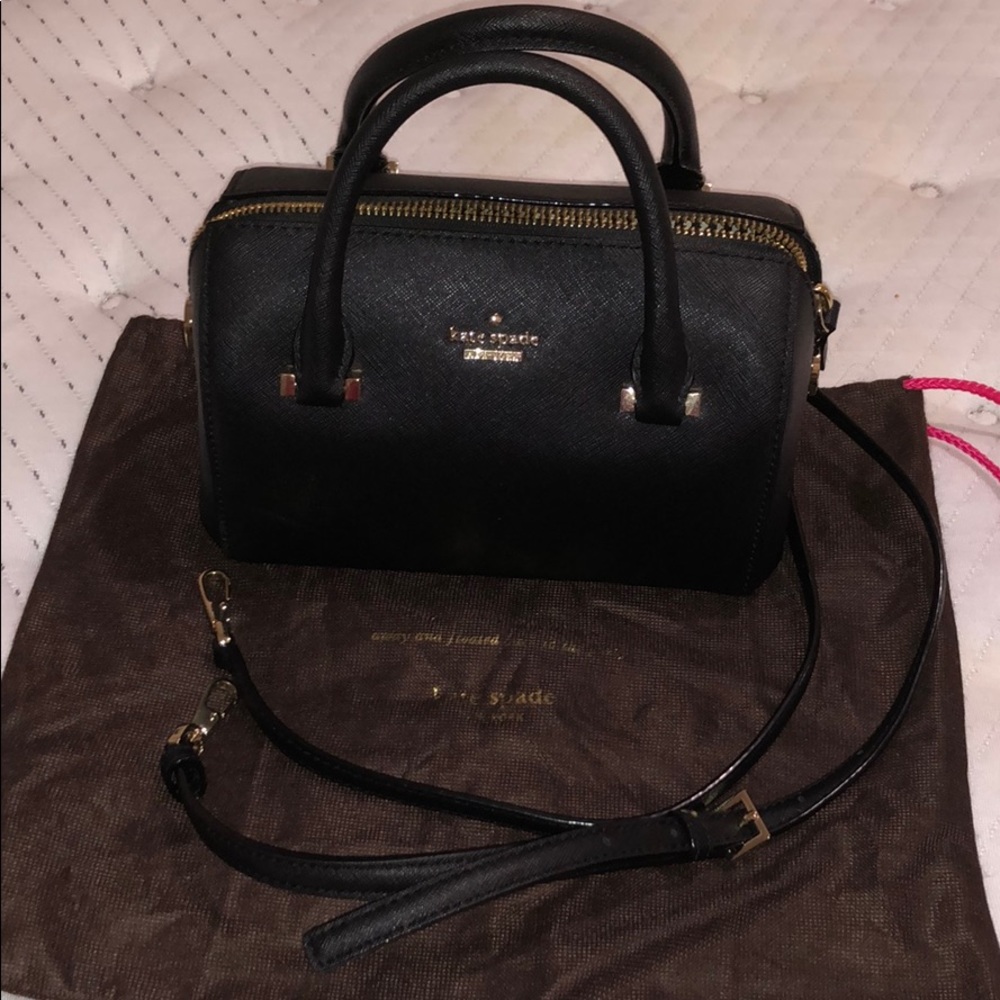 small, black Kate Spade purse